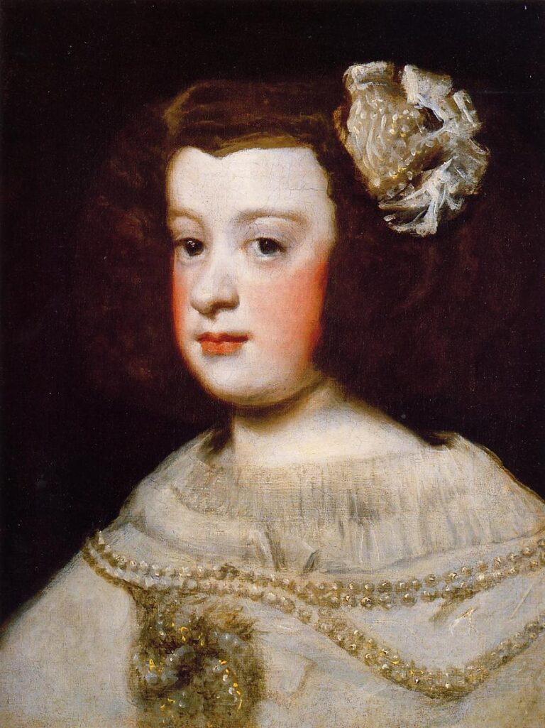 Close, three-quarter view of young Infanta María Teresa with chestnut hair, a white rosette, and a pale jeweled dress; her softly lit face with rosy cheeks turns toward the viewer against a dark, atmospheric background.