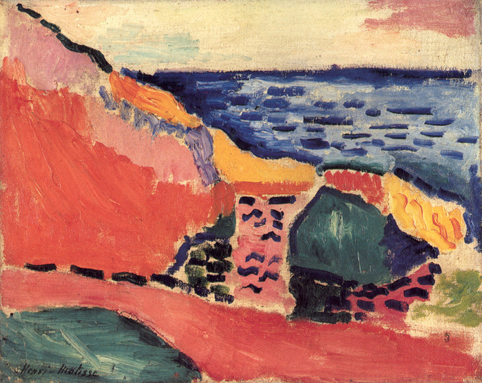 A Fauvist coastal landscape by Henri Matisse showing a large red cliff descending toward a cove, a deep green headland, bright yellow bands like sunlit beaches, and a dark blue sea under a pale sky, all painted with broad, simplified strokes and small dark accents.