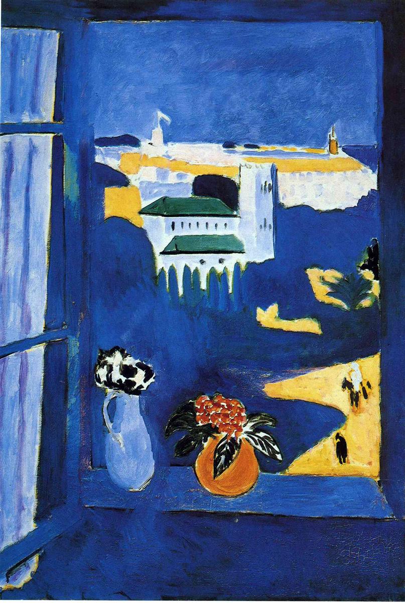 Deep blue window frame and sill with a pale blue pitcher and an orange pot of red flowers in the foreground, opening onto a sunlit Mediterranean city of white buildings, green roofs, and bright yellow paths with small figures, rendered in flat, vivid color by Henri Matisse.