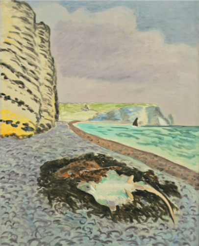 A coastal scene with a tall chalk cliff at left, a curving shingle beach, turquoise water with a small dark sail near the horizon, and two pale rays resting on dark seaweed in the foreground beneath a hazy sky.