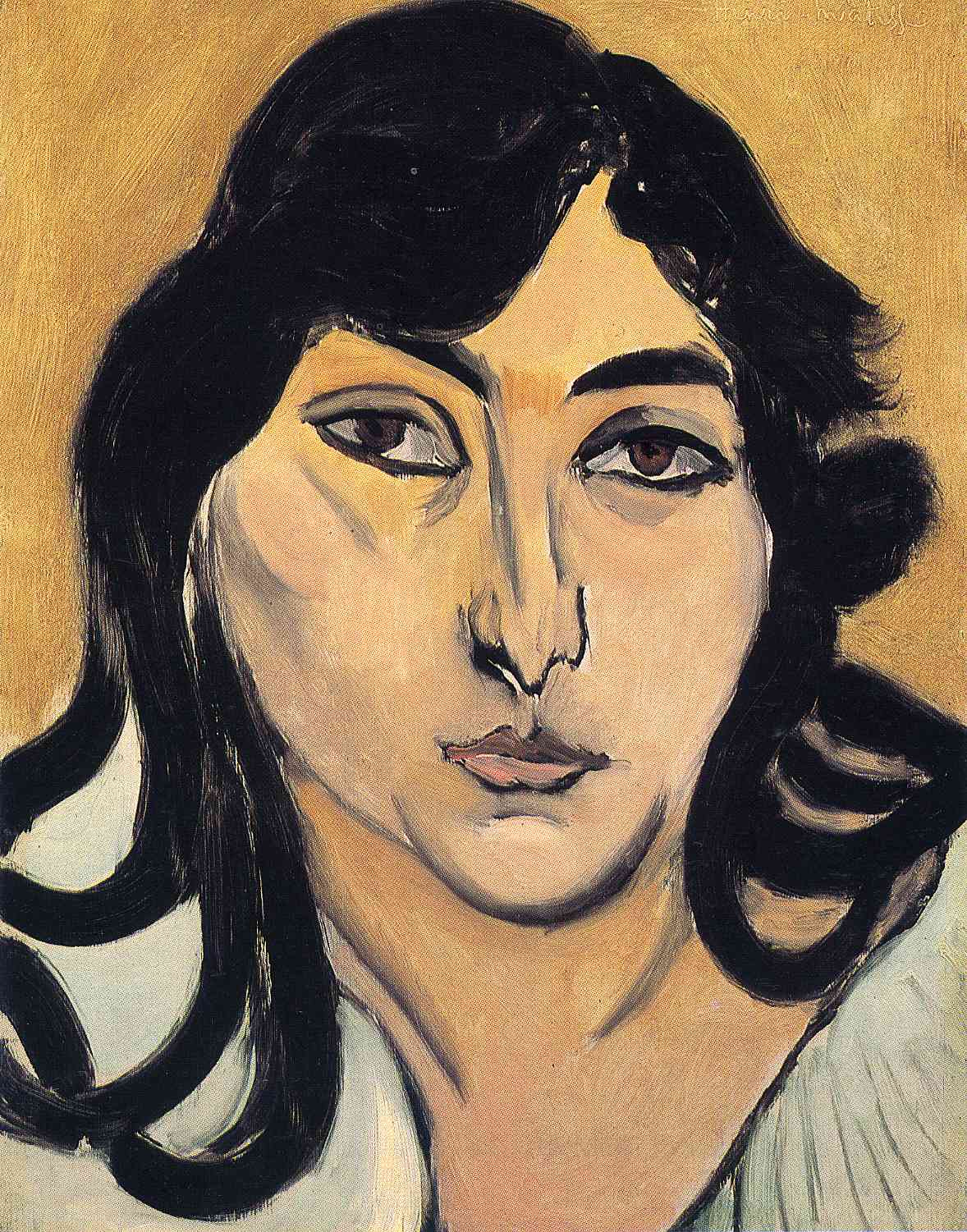 A tightly cropped head-and-shoulders portrait of a dark-haired woman with long black locks, direct brown eyes, and pale skin set against a warm ochre background; simplified features, confident black contours, and visible brushwork characteristic of Henri Matisse’s 1917 style.