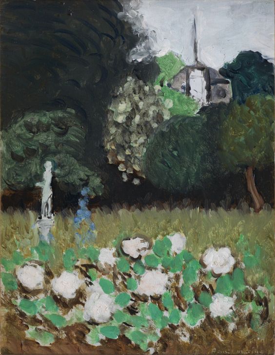 A small landscape by Henri Matisse showing a front band of pale blossoms with green leaves, a narrow meadow, and a dense wall of dark trees; a white garden statue stands at left, while a distant gray house with a tall spire appears above the foliage under a light gray sky; restrained greens, soft light, and calligraphic dark trunks create a quiet, balanced scene.
