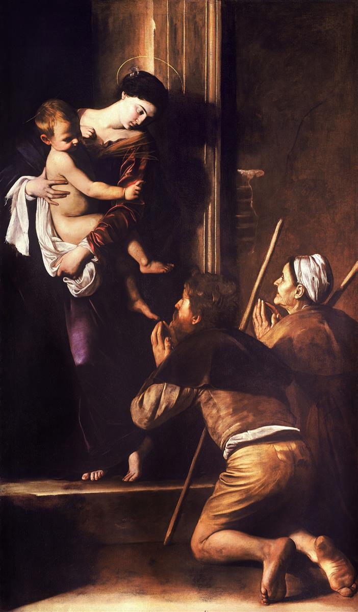 At a stone threshold, the Virgin holds the Christ Child on her hip as two pilgrims with staffs kneel barefoot in prayer; a raking light illuminates faces, hands, and the child’s reaching foot against a dark, humble doorway.