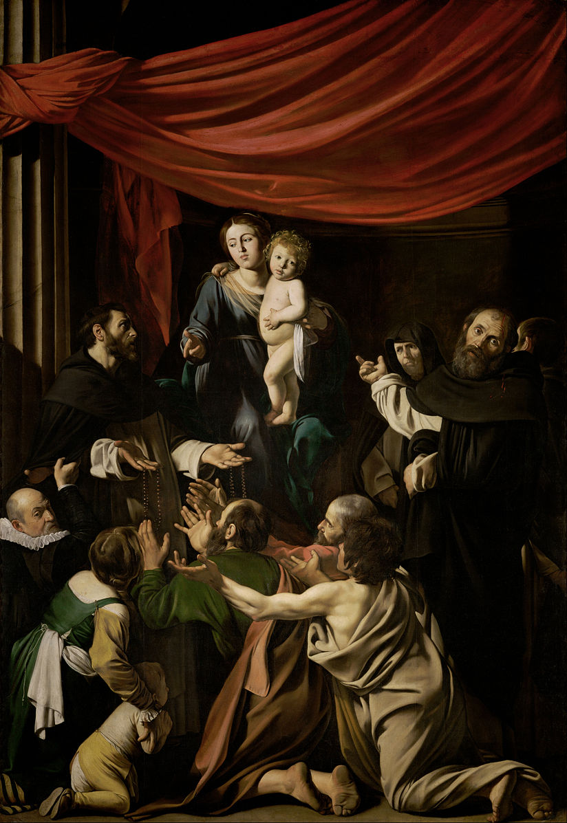Large altarpiece with a red canopy above the Virgin and Child, flanked by Dominican saints distributing rosaries to a kneeling crowd; strong light models faces, hands, and beads against a dark architectural background.