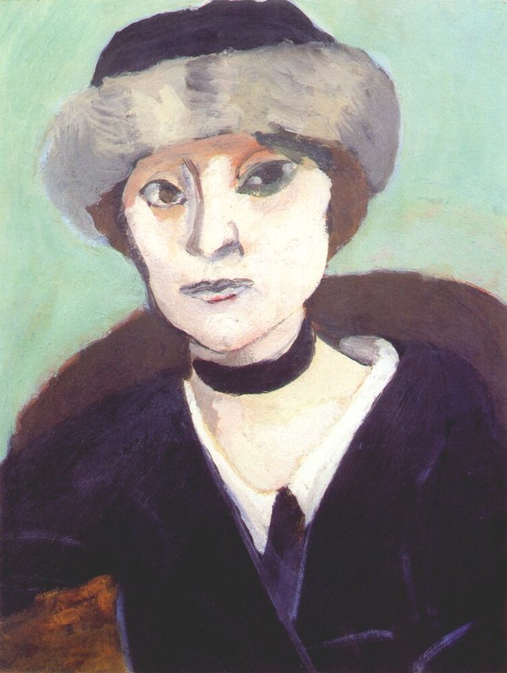 Half-length portrait by Henri Matisse of Marguerite wearing a gray fur-brimmed hat and black choker against a cool green background; pale face modeled by planar strokes, dark jacket and chair, and visible brushwork conveying calm, modern presence.