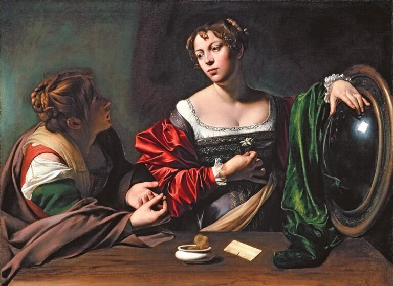 Two women sit at a table in a dark room; at left Martha leans forward counting on her fingers, while at right Mary Magdalene turns from a convex mirror, holding a small flower to her chest and listening, with a comb and cosmetic dish on the table and rich red and green fabrics catching the light.