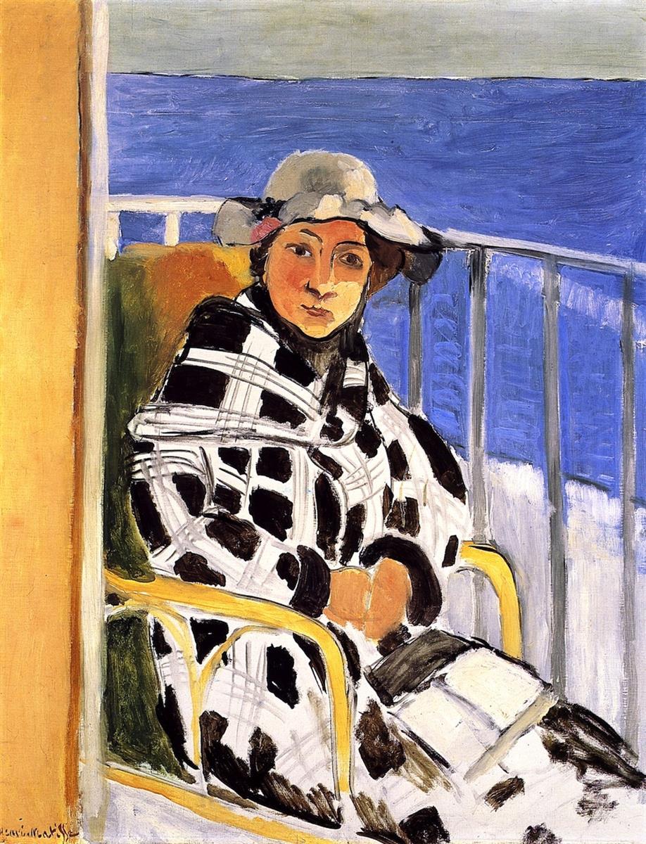 Portrait of a young woman seated on a balcony by the sea, wearing a black-and-white Scottish plaid coat and gray hat; yellow bentwood chair, white railings, deep blue water, and simplified forms with bold black accents in Matisse’s 1918 style.