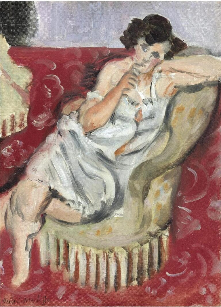 Reclining woman in a white slip lounges in a pale olive, fringed armchair against a deep red patterned backdrop and lilac wall, painted with loose, lively brushstrokes.