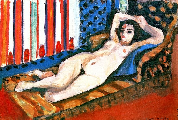 A reclining nude lies diagonally on an ochre patterned couch against a blue dotted wall and a striped red-and-white curtain, with a red floor and blue cushion providing cool contrast in Matisse’s Nice-period interior.