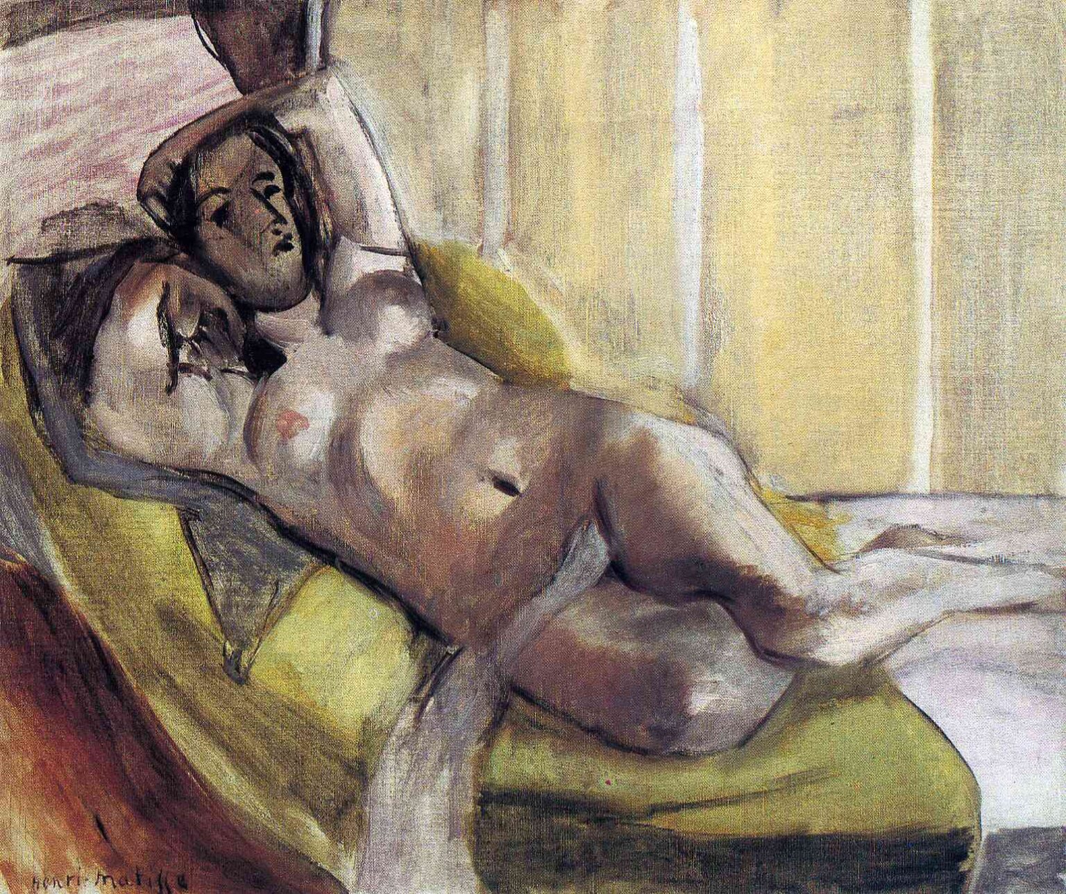 A nude woman reclines diagonally on olive cushions in a muted room; her arms rest behind her head, her body modeled in soft greys and mauves against a background of pale vertical bands, creating a quiet, intimate scene.