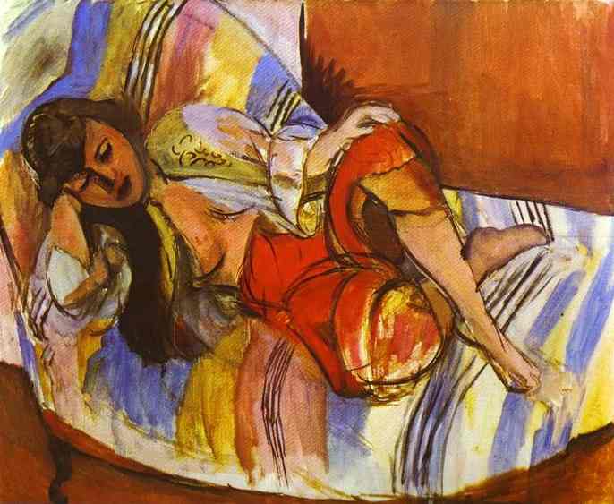 Reclining odalisque in a red skirt and patterned blouse on a striped divan; strong black outlines, slanted blue-yellow stripes, and a large rust-colored wall field; limbs bent and overlapping with dynamic brushwork and warm, saturated color typical of Matisse’s 1923 Nice period.