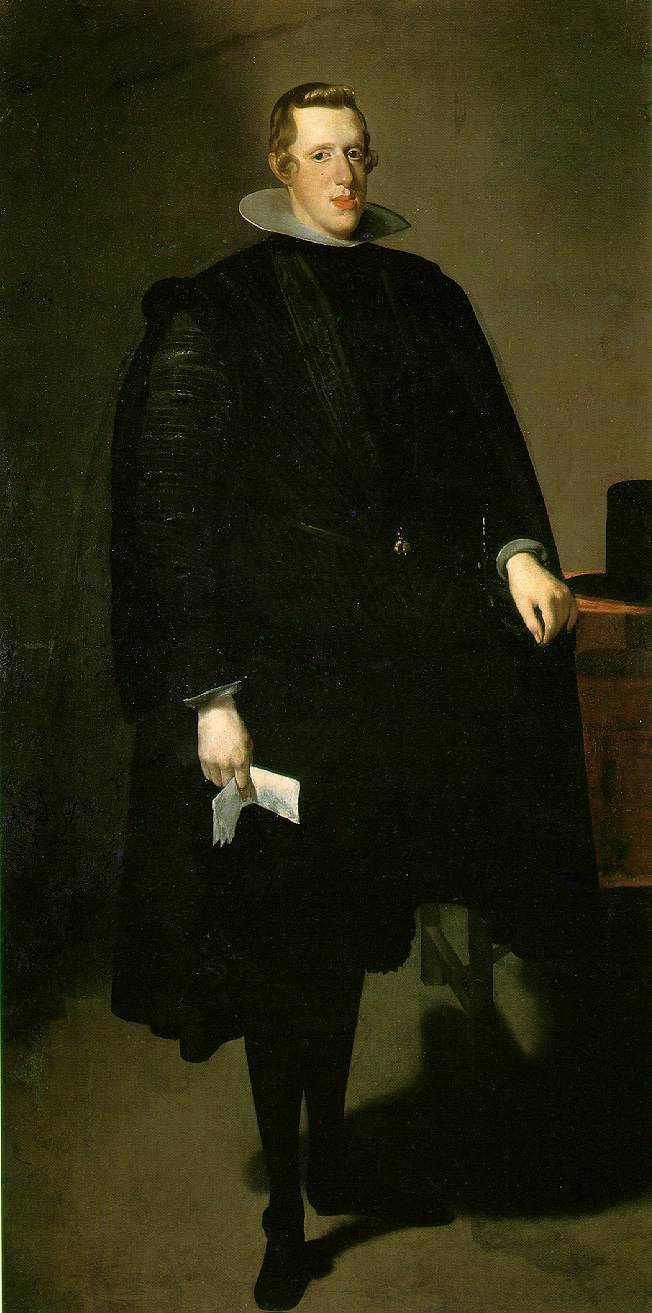Full-length portrait of Philip IV standing in a quiet gray room, wearing black court dress with a high white collar, holding a folded paper in his left hand while light falls from the left to illuminate his face and sleeves; painted by Diego Velazquez in 1627.