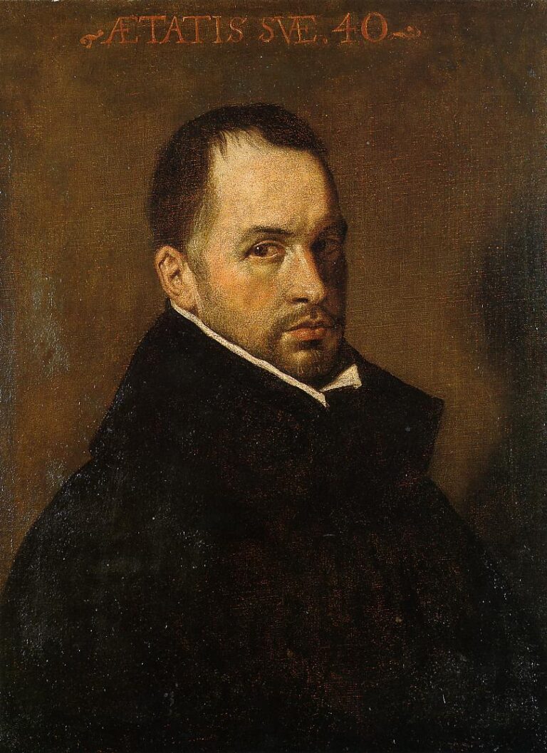 Three-quarter portrait of a forty-year-old cleric in a black robe with a sharp white collar, turning his head toward the light against a warm brown background, in Velazquez’s “Portrait of a Cleric” (1623).