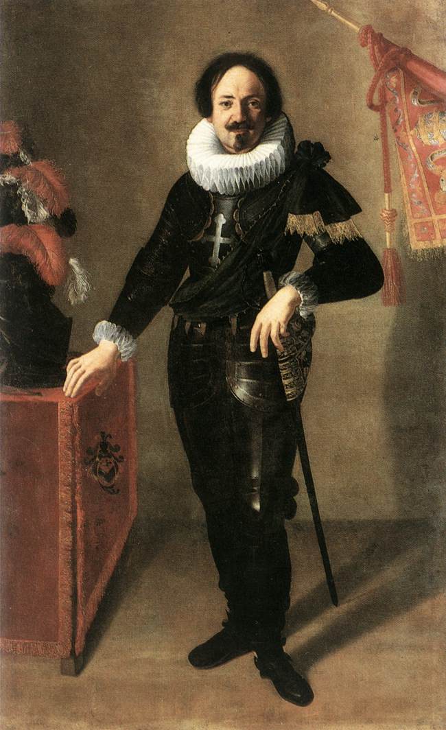 Full-length portrait of a seventeenth-century captain in black attire with white ruff, one hand resting on a red-draped table holding a plumed helmet, the other near his sword; a decorative standard rises at right against a subdued background.