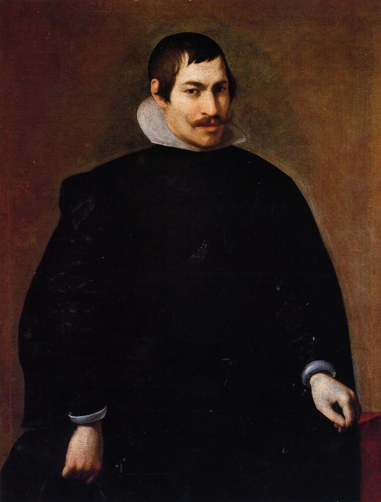 Three-quarter portrait of a man in black attire with a high white collar and pale cuffs, seated before a warm brown background, his head turned slightly left and hands relaxed near a red-draped support; painted by Diego Velazquez.