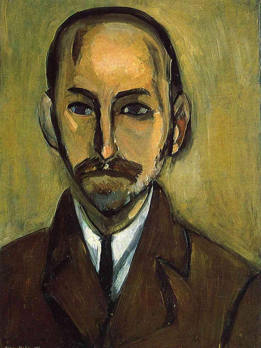 Frontal bust-length portrait of a bald, bearded man in brown suit and dark tie against an olive-ochre background; face constructed with planar brushstrokes, strong black contours around brows, nose, and beard, characteristic of Matisse’s restrained 1916 style.