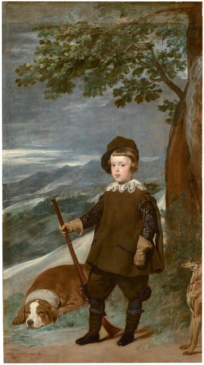 A small boy, Prince Balthasar Carlos, stands in hunting clothes under a tree holding a light gun, with a large sleeping hound at his feet and a greyhound at right; hills and a cloudy blue sky recede into the distance.