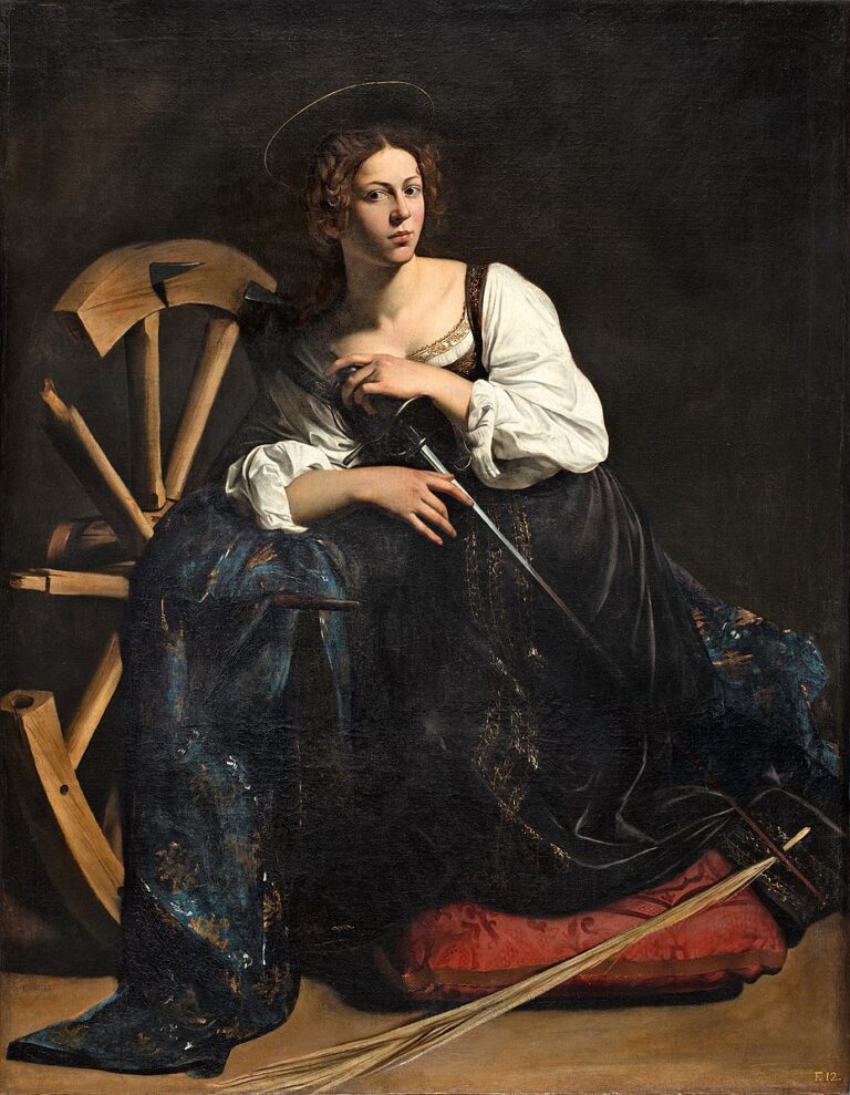A seated young woman identified as Saint Catherine rests on a red cushion, hands folded over a sword in her lap, with a broken spiked wheel behind her and a slim halo above her head; directional light illuminates her face and white sleeves against a dark background.