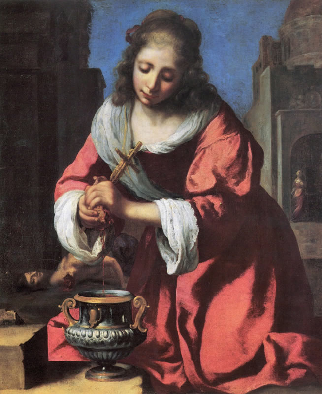 A young woman in a red robe kneels beside a metal urn, gently wringing a blood-soaked sponge while holding a small crucifix, her head bowed in calm devotion before a subdued architectural backdrop.