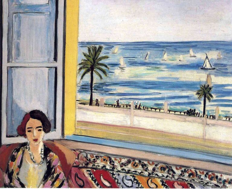 Interior with a woman in a patterned robe seated at left beside a pale blue shutter; an open window reveals a Riviera promenade with palm trees and a blue sea dotted with white sailboats; a yellow jamb and patterned kilim span the foreground, painted in Matisse’s clear Nice-period palette.