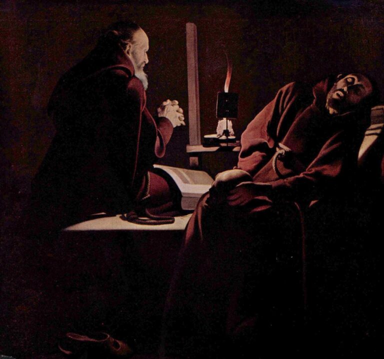 Dark interior with two friars in brown habits; at left a kneeling monk prays beside an open book, at right a monk reclines dying, and a small screened candle between them casts warm light that models faces, hands, and cloth against a plain wall.