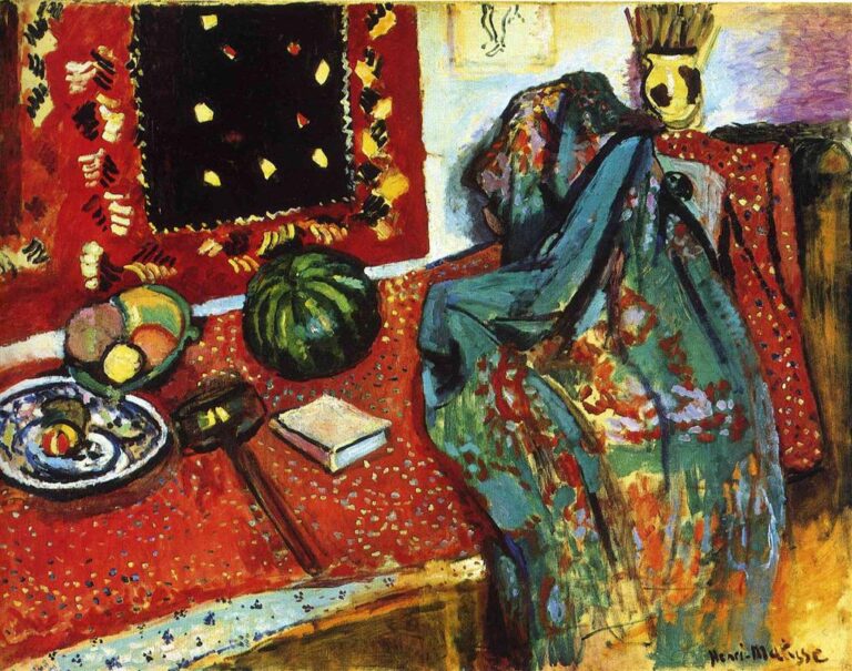 Fauvist interior still life with a red patterned table and wall rug, black-centered hanging studded with yellow motifs, green watermelon, bowl and plate of fruit, pale book and dark utensil on the tabletop, and a sweeping turquoise-green shawl draped over a chair at right; a straw-filled vase sits at the back wall.