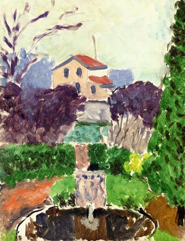 Axial view of a formal garden with dark oval basin, pale fountain pedestal, clipped green hedges, purple shrubs, and a small ochre house with red roofs under a milky sky; tall evergreen at right and bare branches at left; lively, visible brushstrokes characteristic of Matisse in 1918.