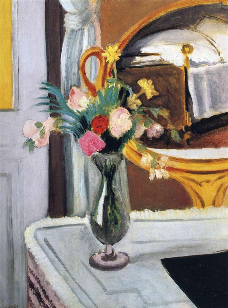 Tall green glass vase of mixed flowers on a pale tabletop before a gold-framed oval mirror reflecting a white-covered bed with brass finial; soft gray door and white curtain at left, small strip of yellow wall, and a dark rectangular object on the table; painted with cool blues, warm ochres, and vivid floral accents.