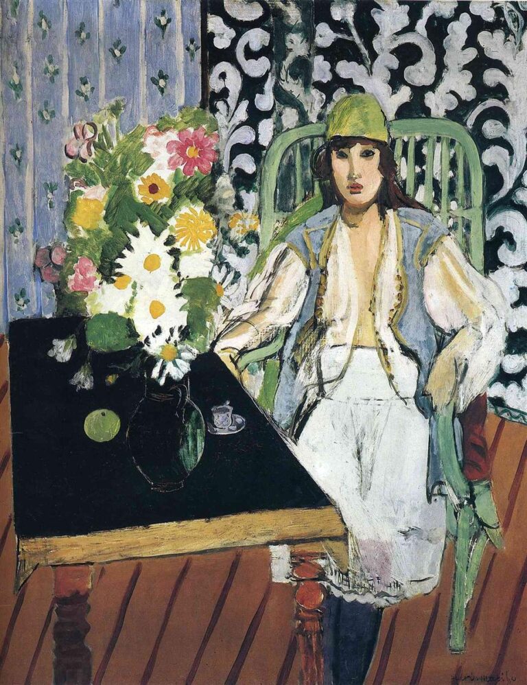 Woman in green chair wearing a green cap and pale blue vest sits beside a triangular black table holding a bouquet, a green apple, a small cup, and a dark jug; background split between lavender striped curtain and dark wall with white arabesques; reddish diagonal floorboards; painted with bold black, mint green, lavender, warm ochre, and vivid floral accents.