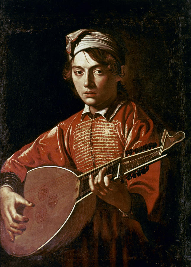 A young musician in a red garment and white headscarf holds a lute against a dark background, his right hand poised to pluck and his steady gaze turned toward the viewer as light glints across the instrument and sleeves.
