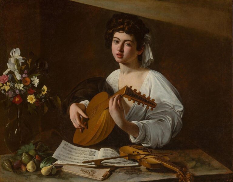 Young musician in white shirt seated at a table, cradling a lute and gazing outward; open sheet music, two violins, and a bouquet of flowers rest nearby on a marble surface against a dark background; natural side light models skin, wood, paper, and glass; oil on canvas by Caravaggio, 1596.