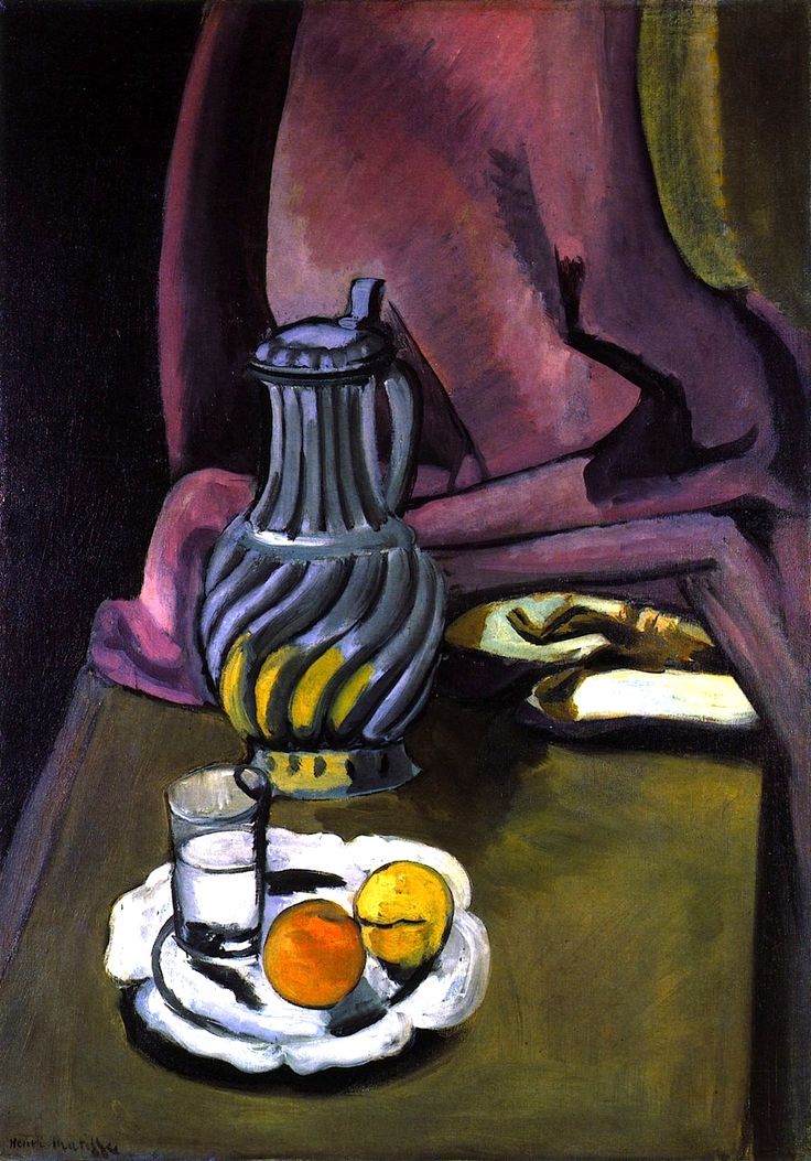 A Matisse still life featuring a tall ribbed pewter jug before a pink-violet drapery, a scalloped white plate with a glass of water, an orange, and a lemon on a tilted tabletop, with decisive black contours, restrained grays and violets, and warm accents of yellow and citrus.