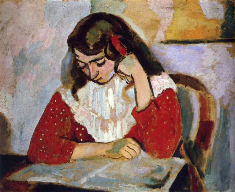 Young woman with dark hair and red ribbon sits reading at a table; she wears a red, dotted dress with a white bib; head bent, elbow propped, in a room of violet-grey and ochre patches; expressive Fauvist brushwork and soft, high-key light.