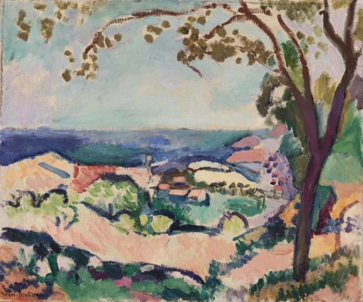 Fauvist landscape viewed from under a tree: dark trunk and leaf-dots frame sunlit pink and green hills descending to a deep blue band of sea beneath a pale, milky sky; forms outlined with soft dark contours, colors clean and luminous (Henri Matisse, 1906).