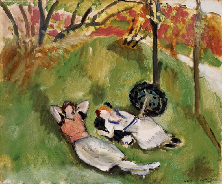 Two women recline on a sloped green hillside beneath lightly sketched trees; one wears a coral top, the other a white dress with blue trim; a dark circular shrub and bands of orange foliage frame the scene in Matisse’s expressive style.