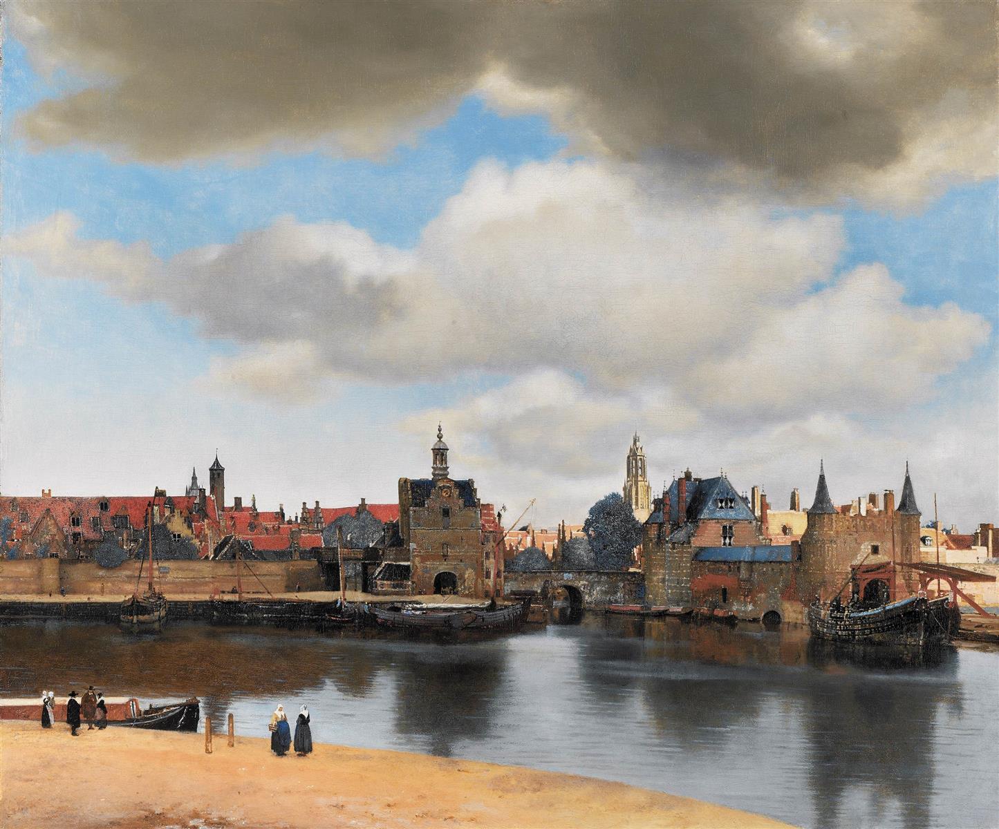 A broad Dutch sky with drifting clouds hangs over a calm river reflecting Delft’s quays, gates, red-tiled roofs, and church towers, while a few figures stand on a sandy bank and moored boats rest along the waterfront.