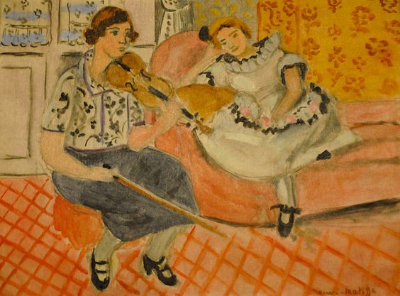 Interior with a woman playing violin and a young girl in a ruffled white dress leaning on a pink sofa; coral-red gridded floor, orange floral wall, and a pale window frame the scene in Henri Matisse’s Nice-period painting.