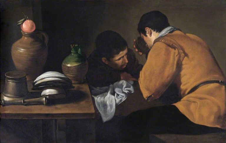 Two youths share a simple meal at a wooden table as light strikes stacked plates, jugs, and a white cloth; one drinks from a bowl while the other leans in to speak in Velazquez’s “Two Young Men Eating at a Humble Table” (1622).