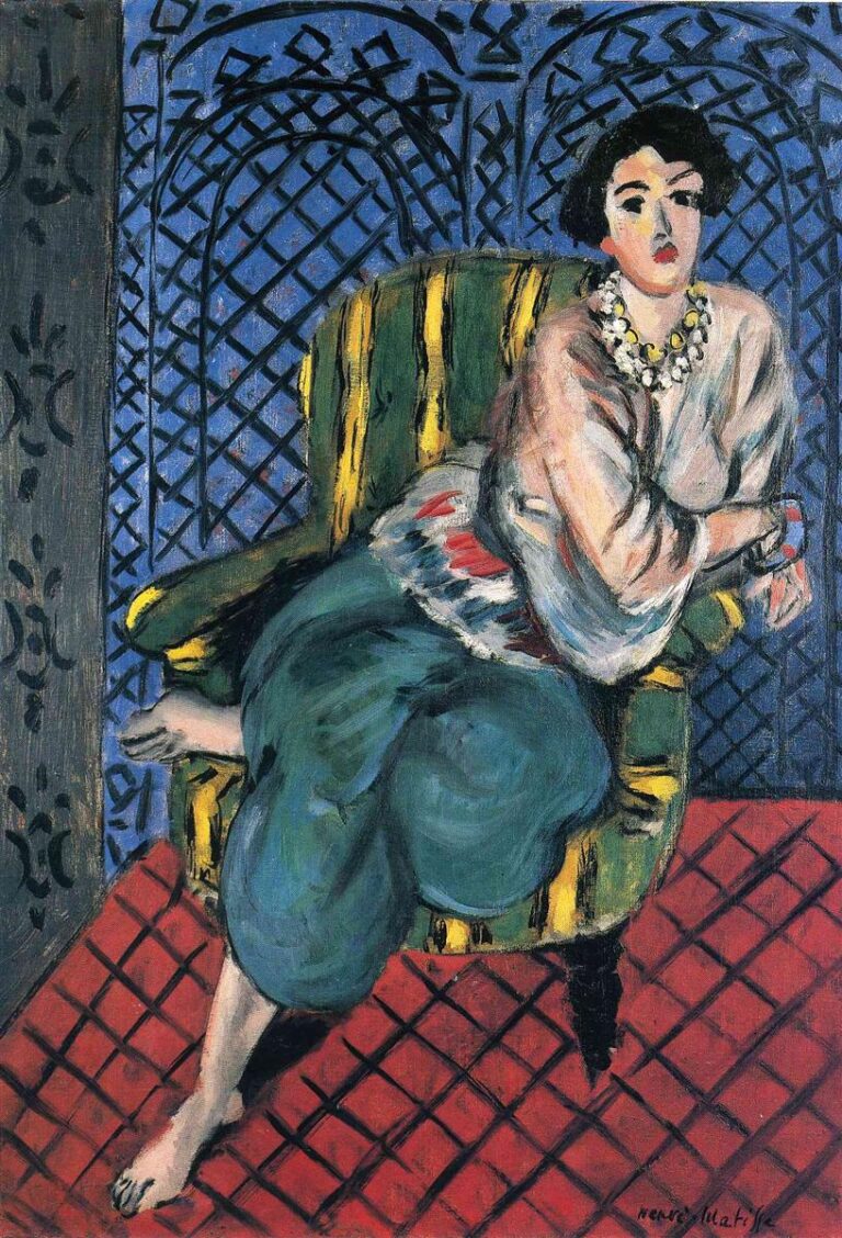 Woman with short dark hair and beaded necklace seated in a green-and-yellow striped armchair; blue lattice screen behind and red diamond-tiled floor below; pale blouse, turquoise trousers, and bare feet painted in Matisse’s 1926 Nice-period style.