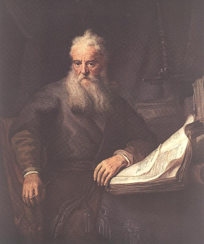 Elderly Apostle Paul seated in a dim interior, long white beard and thoughtful gaze, left hand resting on a large open book that glows in the light while the surrounding room fades into shadow.