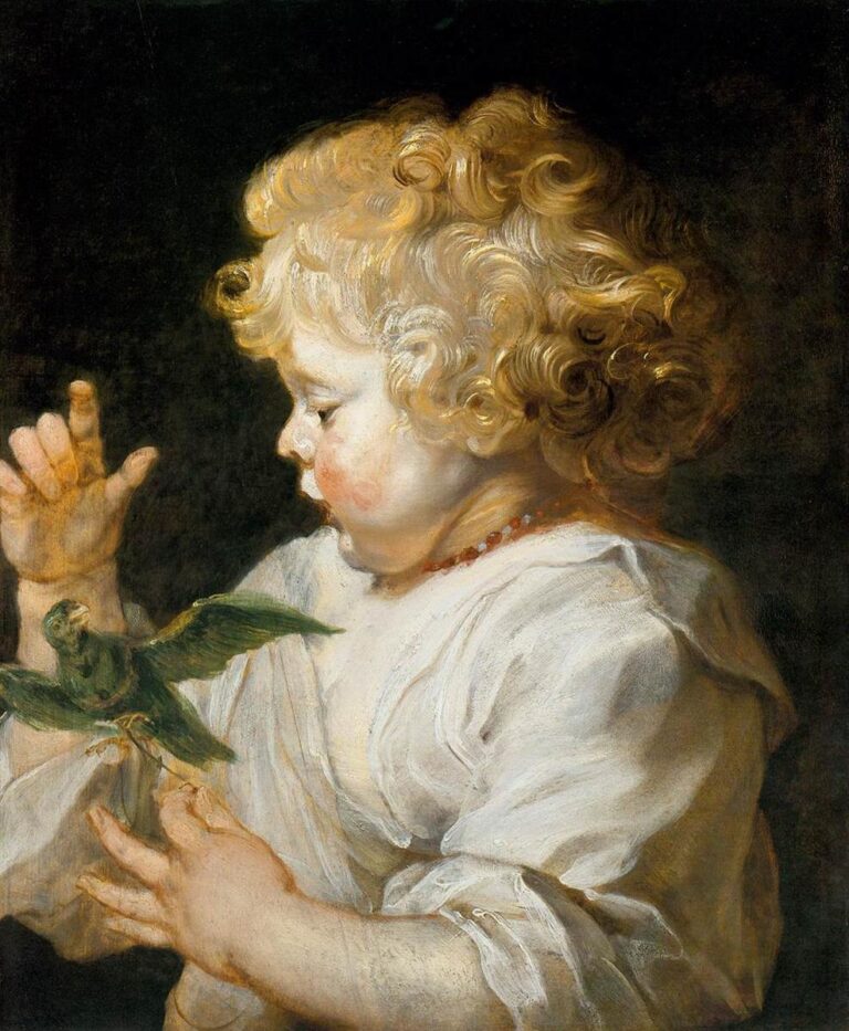 Close portrait of a curly-haired toddler in a white smock, shown in profile against a dark background, gently raising one hand while a small green bird flutters near the other; warm light glows on hair and cheeks, conveying a quiet, intimate scene.