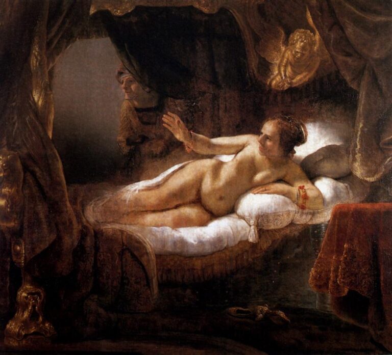 Rembrandt painting of Danaë reclining nude on a canopy bed, her right hand raised toward an unseen visitor as warm light falls across her body; a maid peers from a doorway, heavy draperies frame the scene, and a red tablecloth glows in the foreground.
