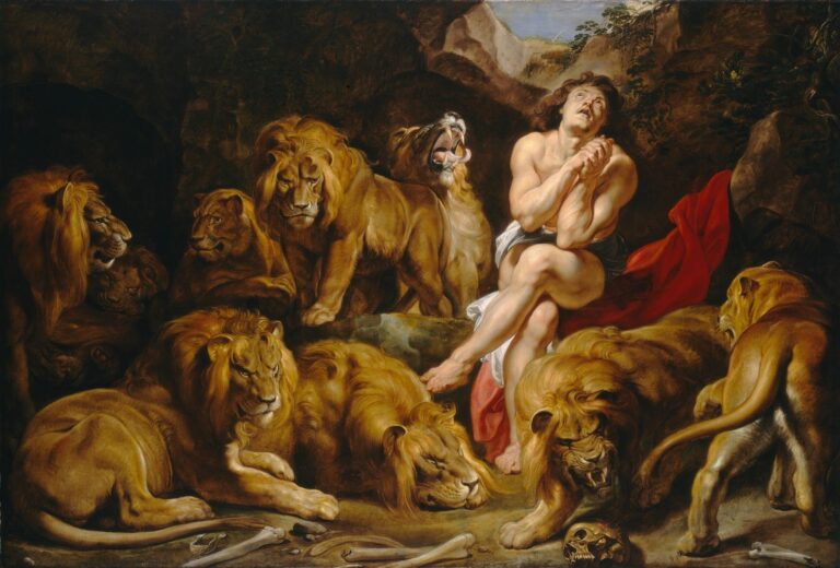In a rocky den lit from above, Daniel sits praying with hands clasped while a circle of golden lions and lionesses, some snarling and others sleeping, surrounds him; red drapery pools behind, bones lie on the ground, and a narrow strip of blue sky opens high above.