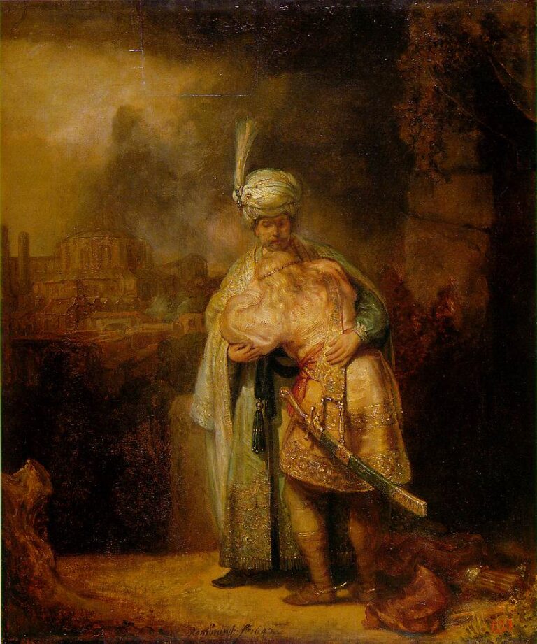 Rembrandt’s 1642 painting shows David and Jonathan embracing in a rocky clearing; Jonathan in a pale jeweled robe and turban consoles the armored David, whose sword angles across his ornate tunic, with a hazy city and stormy sky in the background.