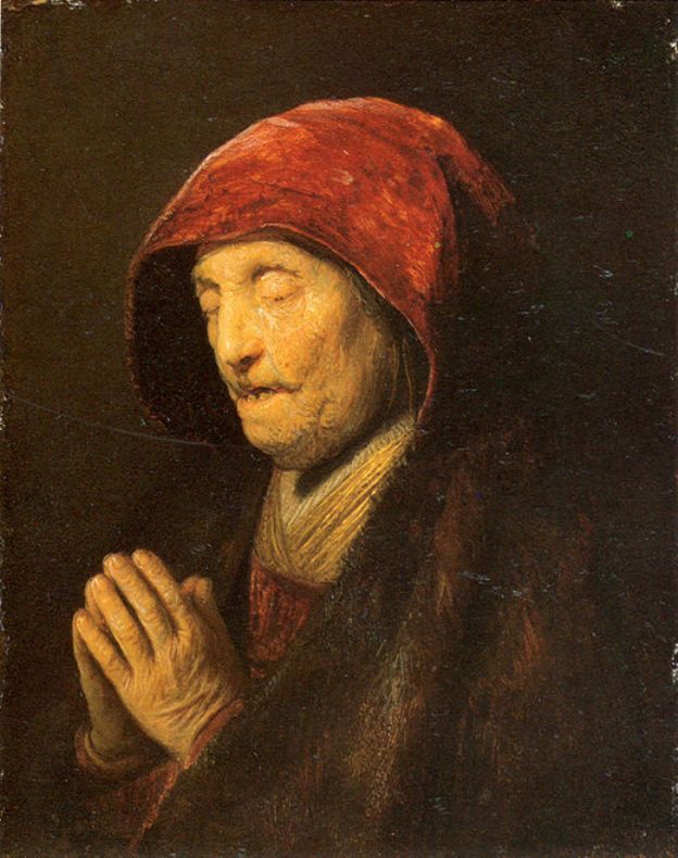 An intimate oil painting of an elderly woman in a red hood, eyes closed and hands interlaced in prayer; warm light grazes her face and fingers while a dark, soft background keeps the scene hushed and contemplative.