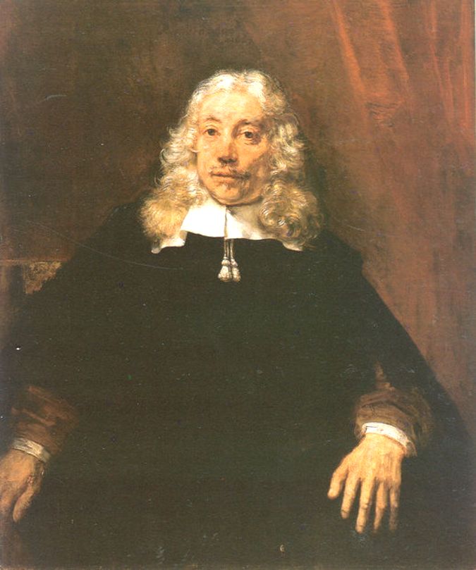 Rembrandt’s 1667 portrait of a seated man with long gray hair, a bright white collar, and dark clothing, shown against a warm curtain, his right hand relaxed in the foreground and his thoughtful face softly illuminated.