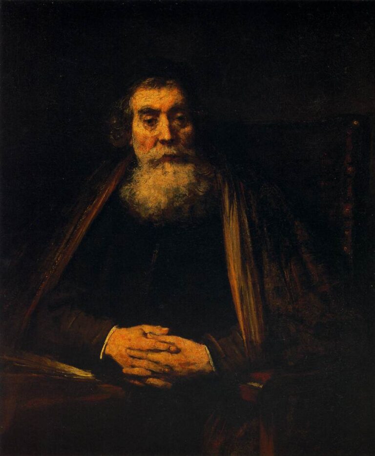 Rembrandt’s 1665 portrait of an elderly man seated in a dark interior, his bearded face softly lit and his hands gently folded, with warm browns and thick brushwork creating a calm, introspective atmosphere.