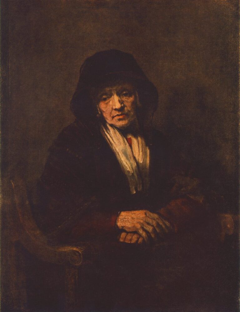 Dark, intimate portrait of an elderly woman in a hooded mantle, illuminated softly across her face and white scarf, with folded hands resting on a chair arm against a warm brown background.