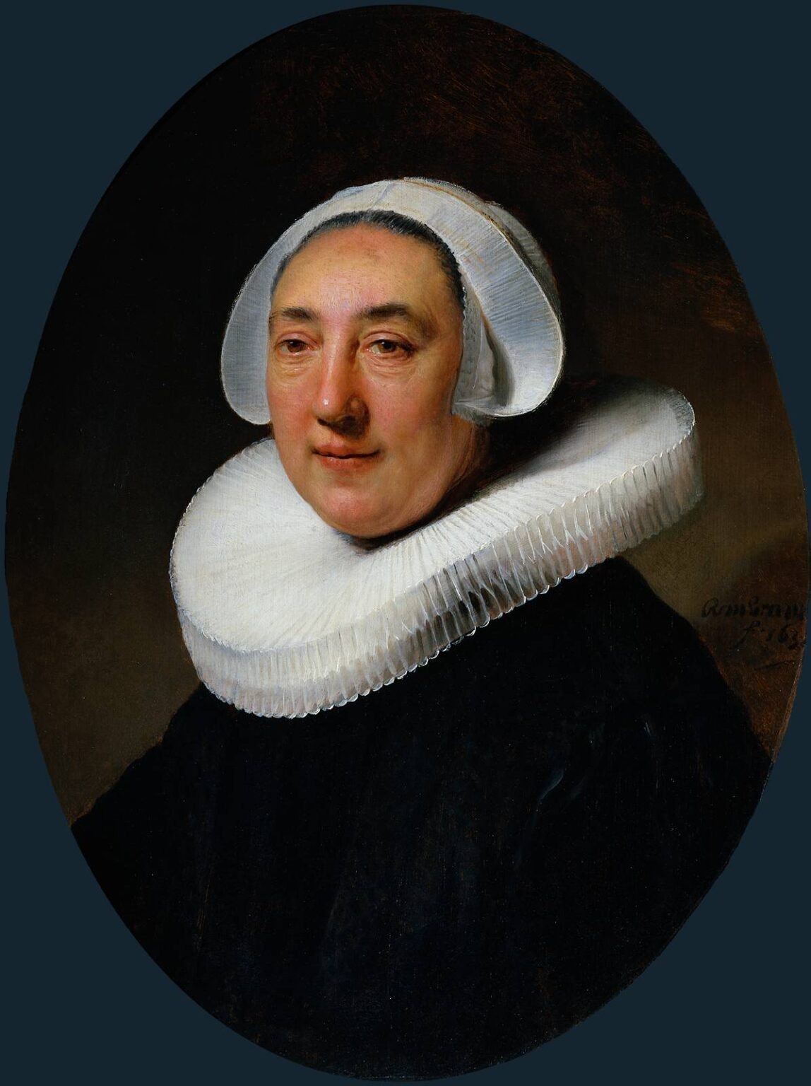 Oval half-length portrait of Haesje van Cleyburgh in black dress with a crisp white ruff and translucent cap, softly lit against a brown ground, painted by Rembrandt in 1634.