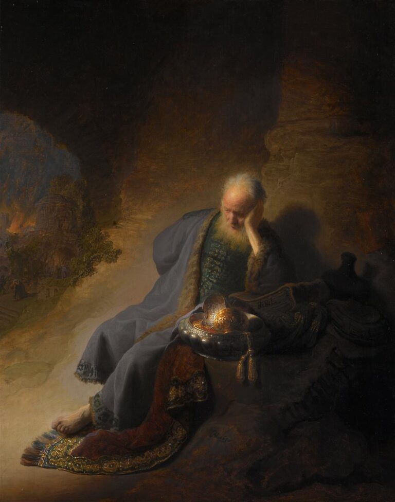 An oil painting of the prophet Jeremiah seated in a rocky grotto, head in hand, illuminated by warm light while golden temple vessels gleam beside him; in the hazy distance at left, Jerusalem burns under a dark sky.